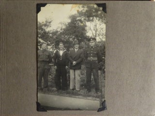 A sailor's Second World War photo album including eight original, unpublished photographs of Prime Minister Winston S. Churchill in Iceland during his return from meeting with President Roosevelt in Placentia Bay and just days after their announcement of the Atlantic Charter