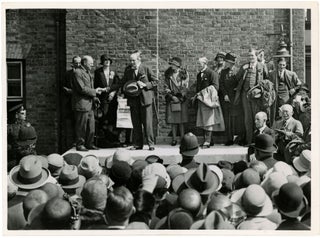 Item #005025 An original press photograph of Winston S. Churchill on stage for the announcement...