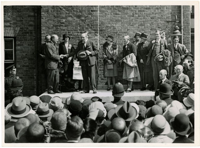 Item #005025 An original press photograph of Winston S. Churchill on stage for the announcement of his Parliamentary victory in Epping on 31 May 1929