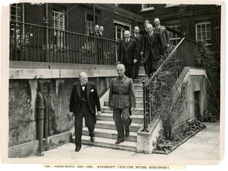 Item #005026 An original wartime press photograph of Prime Minister Winston S. Churchill and...
