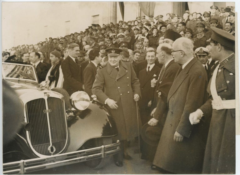 Item #005211 An original wartime press photograph of Prime Minister Winston S. Churchill and Foreign Secretary Anthony Eden arriving in Athens on 14 February 1945, just after the Yalta Conference and the signing of the Treaty of Varkiza