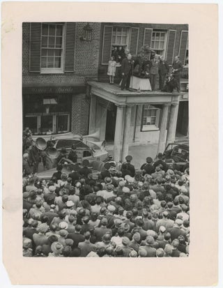 An original wartime press photograph of Prime Minister Winston S. Churchill delivering a campaign speech from a rooftop on 25 June 1945, preparing for the General Election that ended his wartime premiership