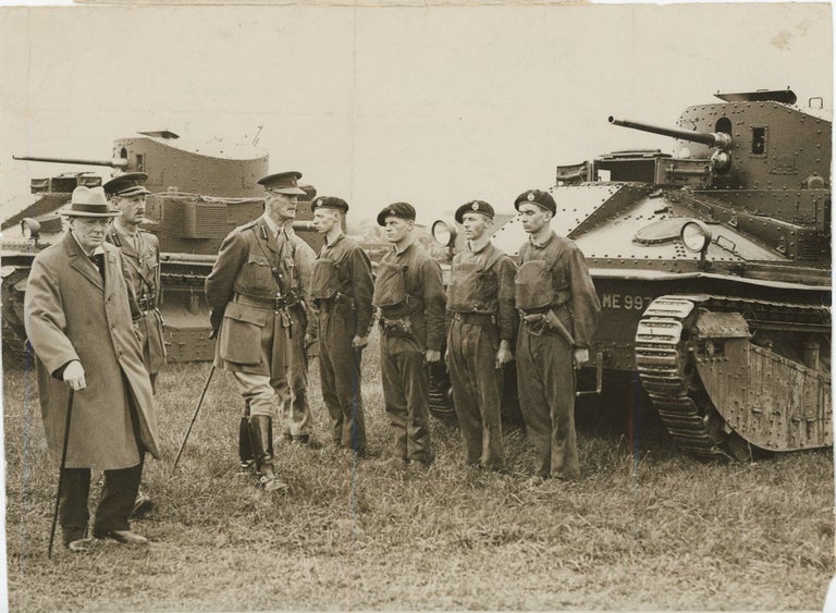 Item #005244 An original press photograph of then-Chancellor of the Exchequer Winston S. Churchill accompanied by General Sir Alexander Godley inspecting the newly formed Experimental Mechanised Force on 31 August 1927