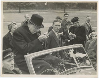 Item #005279 An original Second World War press photograph of Prime Minister Winston S. Churchill...