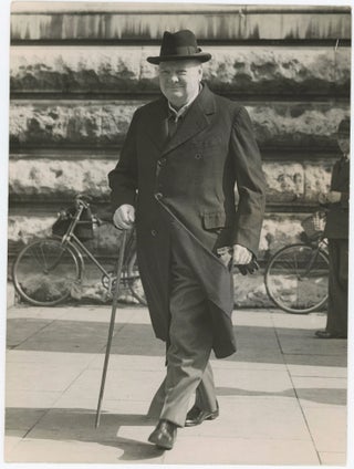 Item #005299 PRIME MINISTER BACK IN LONDON - An original Second World War press photograph of a...