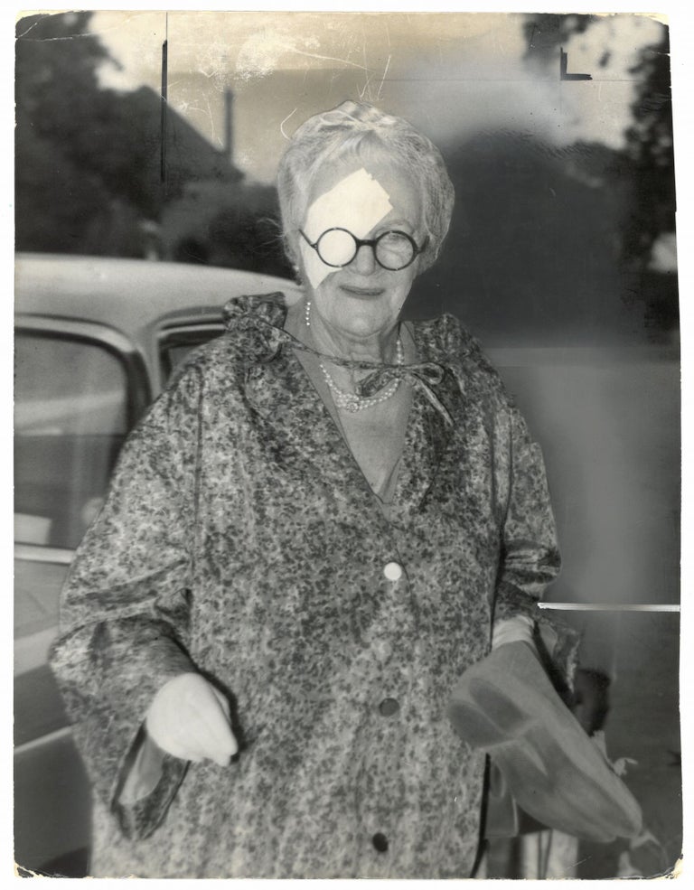 Item #005353 An original press photo of Lady Clementine Churchill wearing an eyepatch, published on 1 September 1959