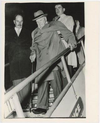 Item #005384 An original press photo of Sir Winston S. Churchill on 29 September 1960 being...