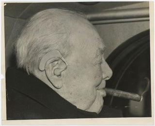 Item #005387 An original press photo of Sir Winston S. Churchill on 9 December 1958 leaving a...