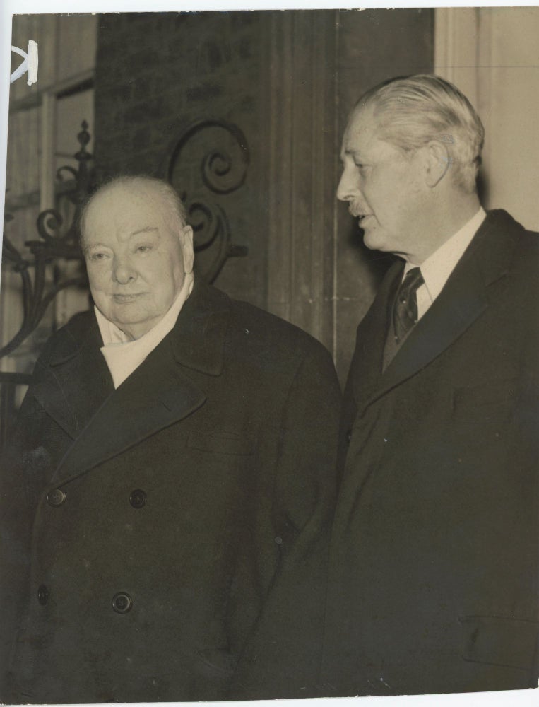 Item #005415 An original press photo of Sir Winston S. Churchill with Prime Minister Harold Macmillan at 10 Downing Street on 13 December 1957