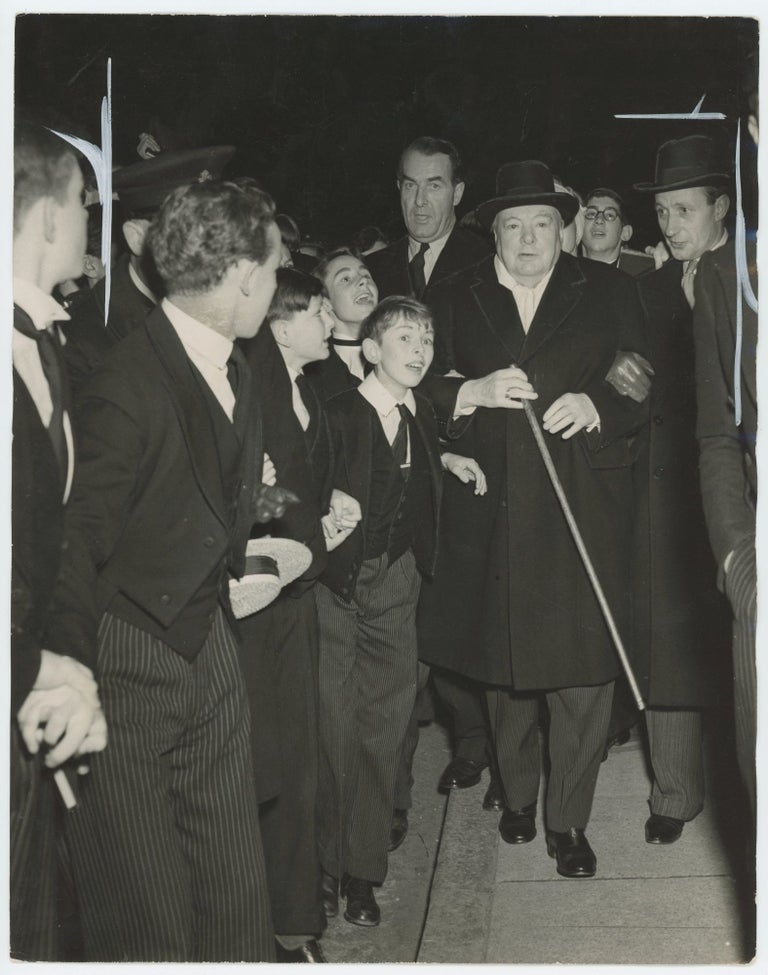 Item #005451 An original press photograph of Prime Minister Winston S. Churchill on 7 November 1952 during his annual visit to Harrow, his boyhood school, for Harrow's annual Songs