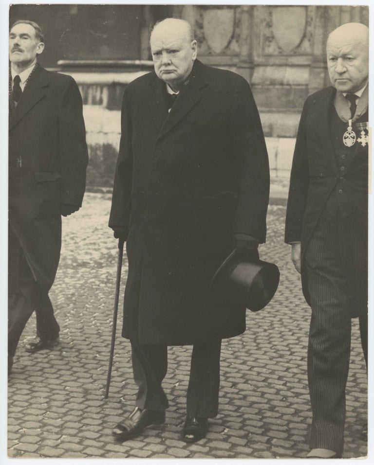 Item #005452 An original press photo of Sir Winston S. Churchill at the 21 February 1956 funeral of Lord Hugh Trenchard, the "Father of the Royal Air Force"