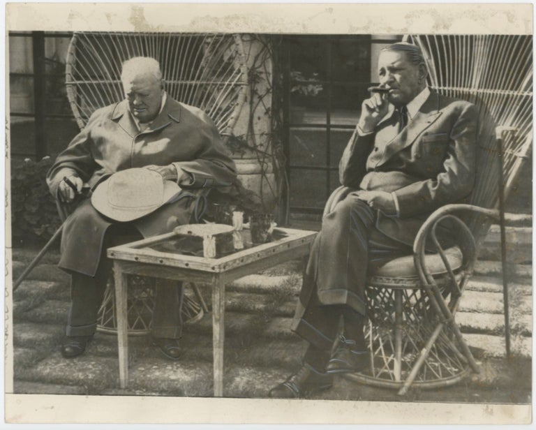 Item #005453 An original press photo of Sir Winston S. Churchill and former French President René Coty on 5 April 1959 at La Pausa in the South of France