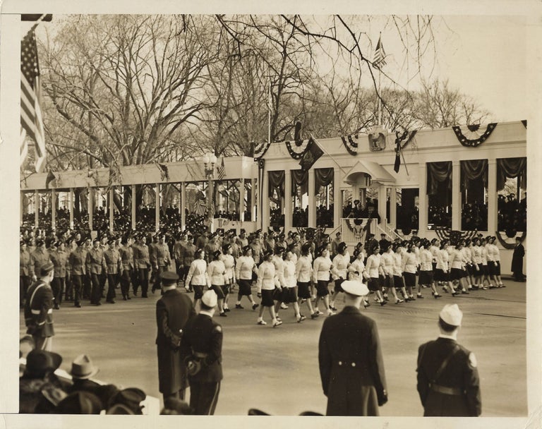 Item #005498 An original press photo of the 20 January 1941 Inaugural Parade for Franklin Delano Roosevelt’s unprecedented and unrepeated third presidential term, youth of his National Youth Administration passing in review as the President waves his hat