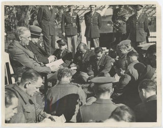 Item #005569 An original wartime press photograph of Prime Minister Winston S. Churchill and...