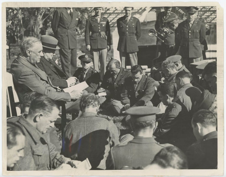 Item #005569 An original wartime press photograph of Prime Minister Winston S. Churchill and President Franklin D. Roosevelt meeting with British and American war correspondents at the Casablanca Conference on 24 January 1943