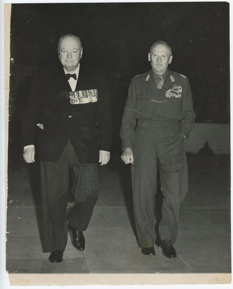 Item #005628 EL ALAMEIN RE-UNION AT THE EMPRESS HALL - An original press photograph of Winston S. Churchill and Field Marshal Montgomery at the El Alamein Reunion on 20 October 1950