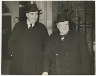 Item #005655 An original wartime press photograph of British Prime Minister Winston S. Churchill...