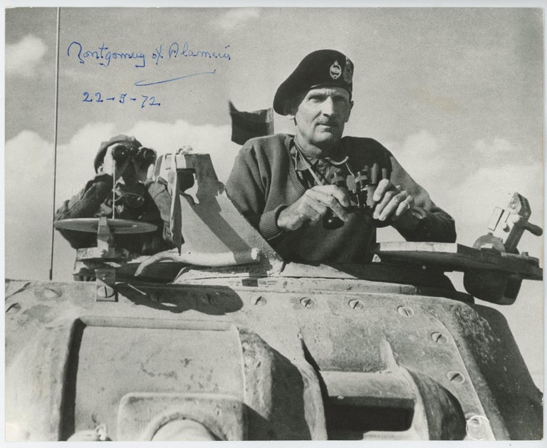 Item #005854 "MONTY IN THE WESTERN DESERT" - a 5 November 1942 Second World War image of then-General Bernard Law Montgomery in the turret of his Grant command tank at El Alamein, originally captured by a member of the Army's Film & Photographic Unit and signed and dated by Montgomery on 22 May 1972. Image, No. 1 Army Film Major Geoffrey Keating, Photographic Unit.