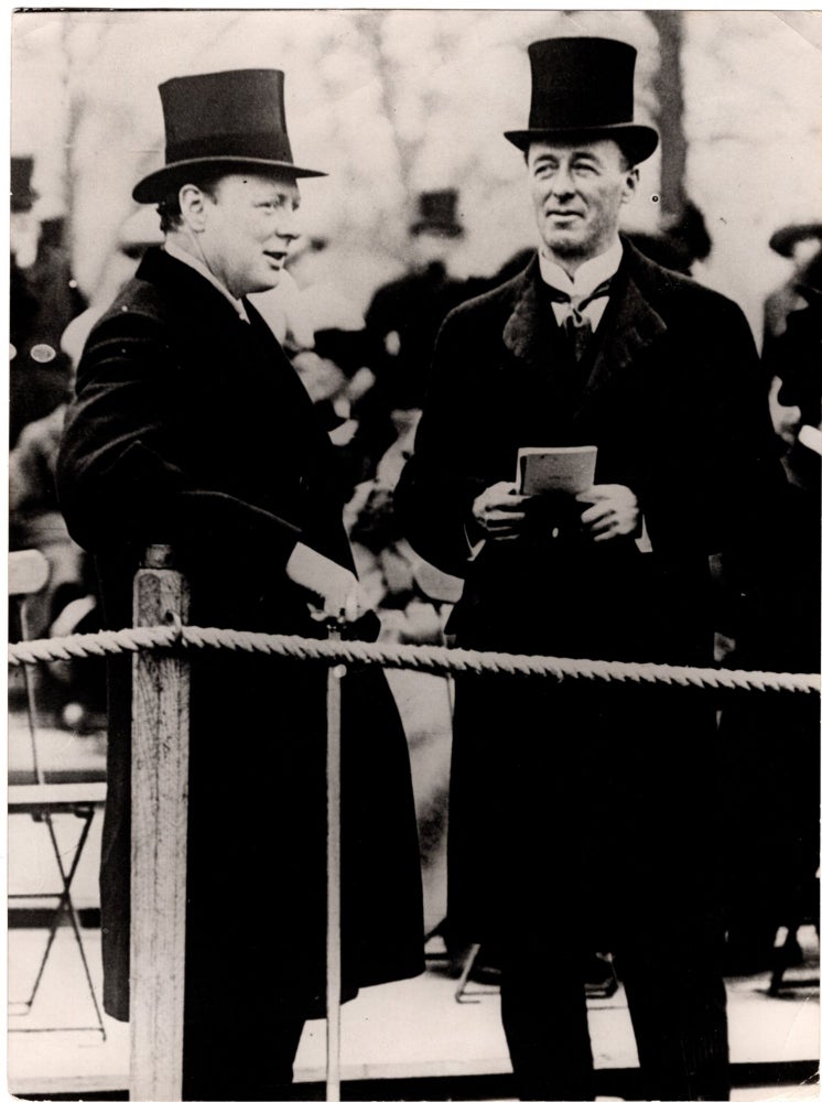 Item #005991 An original press photograph of then-First Lord of the Admiralty Winston Churchill and his friend and fellow Cabinet member, then-Secretary of State for War Jack Seely, watching the Review of the Brigade Guard in Hyde Park in 1913, on the verge of the First World War which would see them become the only two Cabinet members to also serve on the Front
