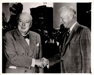 Item #006105 An original press photograph of Prime Minister Sir Winston S. Churchill bidding...