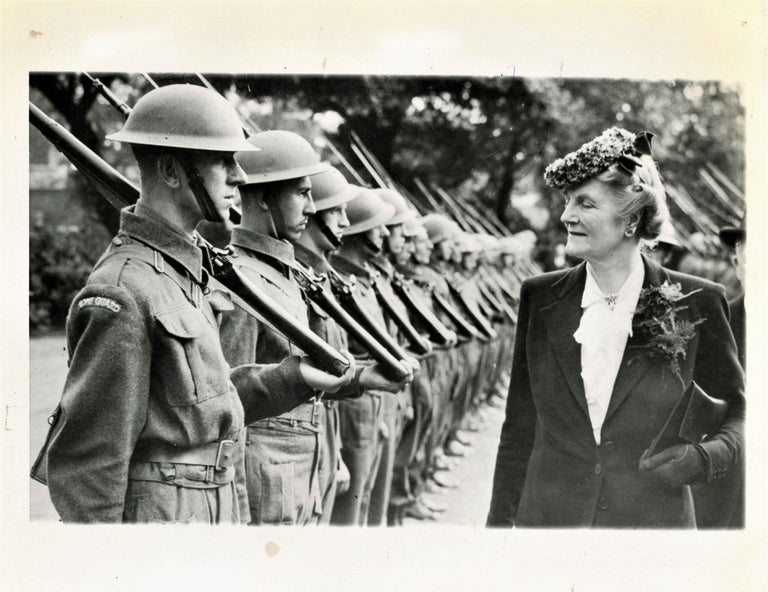 Item #006134 A truly striking original Second World War press photograph of Prime Minister Winston S. Churchill's wife, Clementine, inspecting the Home Guard of the Port of London on 22 July 1941