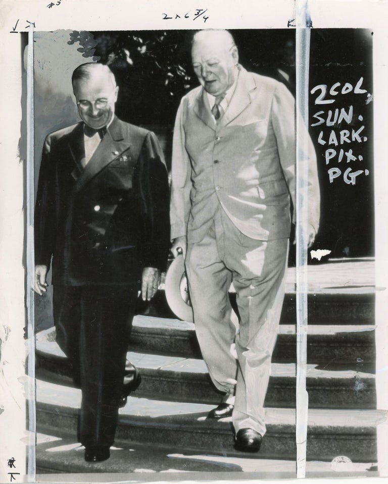 Item #006148 An original press photograph of U.S. President Harry S. Truman and British Prime Minister Winston S. Churchill captured on 16 July 1945 in Potsdam, a day before the conference with Stalin and just ten days before the abrupt termination of Churchill's wartime premiership