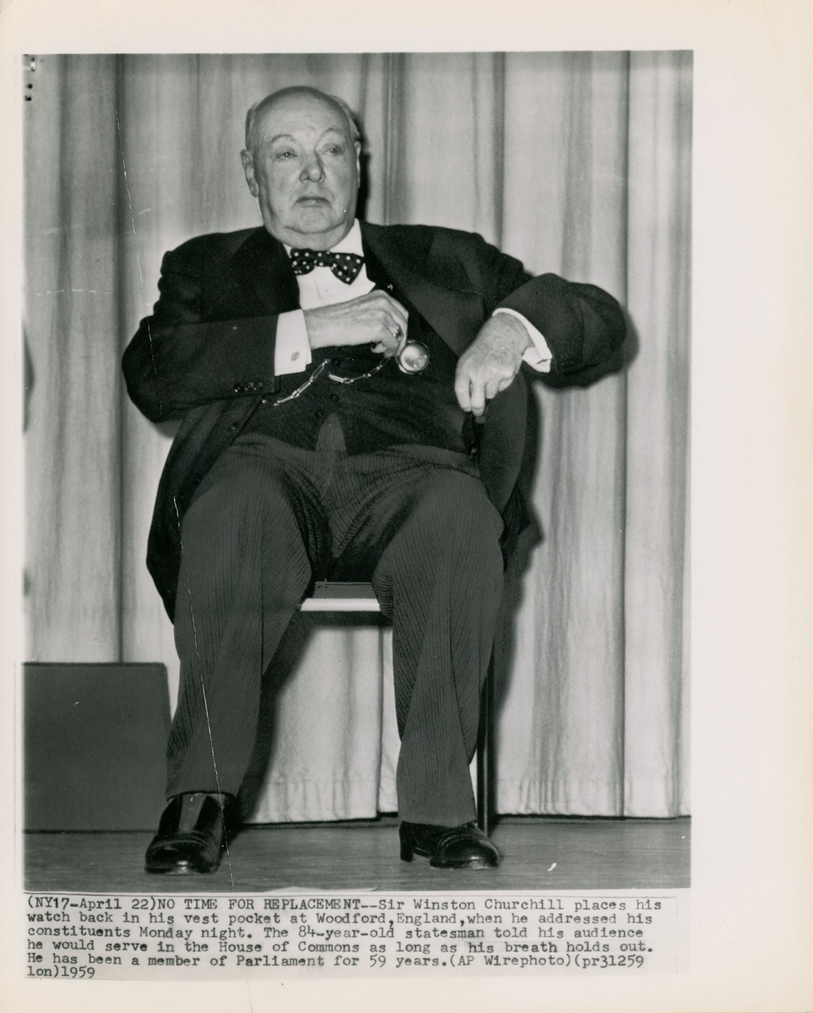 NO TIME FOR REPLACEMENT - An original 20 April 1959 press photograph of  Winston S. Churchill speaking to his Woodford constituents to announce what 