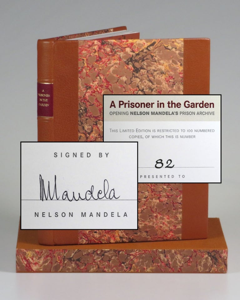 Item #006993 A Prisoner in the Garden: Opening Nelson Mandela's Prison Archive, Copy No. 82 of 100 presentation copies thus, finely bound by the publisher and signed by Mandela. Nelson Mandela.