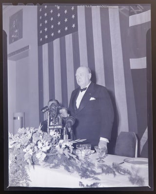 Three original photograph negatives and an elaborate program, comprising a small archive from the 15 March 1946 dinner held by the City of New York at the Waldorf Astoria Hotel in honor of Winston S. Churchill, during which he spoke, staunchly defending the content of his inflammatory “Iron Curtain” speech delivered ten days earlier