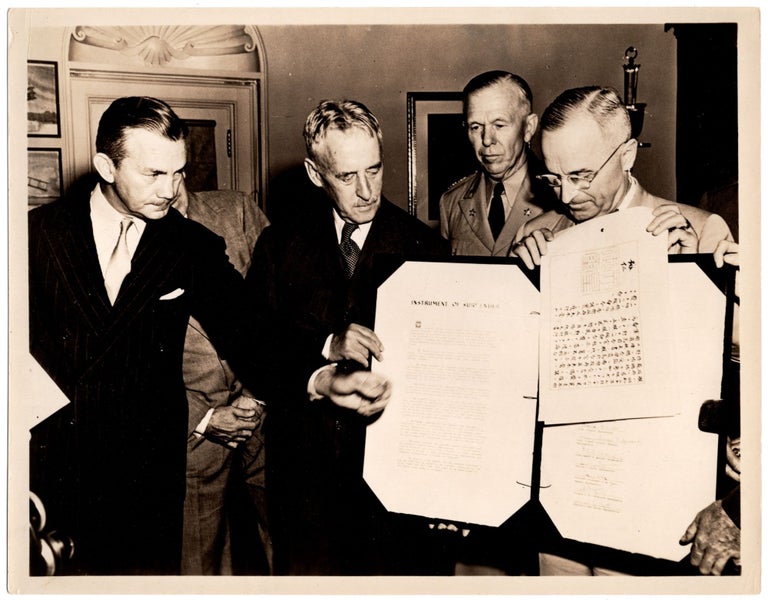An original Second World War Official U.S. Navy photograph of President Harry S. Truman at the...