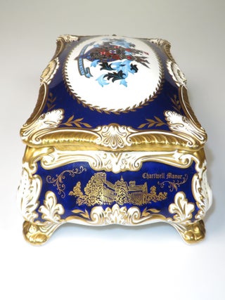 Elaborately detailed bone china cigar casket produced in 1974 for the centenary of Winston S. Churchill's birth, complete with cedar lining and original presentation case, copy #316 of the limited edition, accompanied by the original limitation certificate