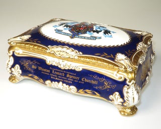Elaborately detailed bone china cigar casket produced in 1974 for the centenary of Winston S. Churchill's birth, complete with cedar lining and original presentation case, copy #316 of the limited edition, accompanied by the original limitation certificate
