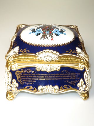 Elaborately detailed bone china cigar casket produced in 1974 for the centenary of Winston S. Churchill's birth, complete with cedar lining and original presentation case, copy #316 of the limited edition, accompanied by the original limitation certificate