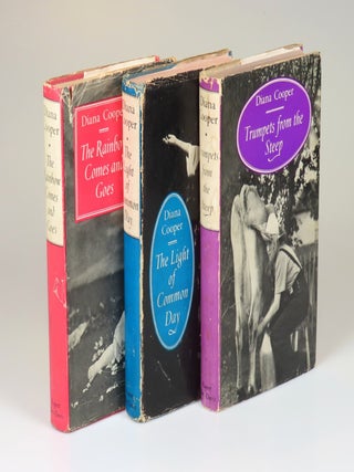All three volumes of Lady Diana Cooper's memoirs, The Rainbow Comes and Goes, The Light of Common Day, and Trumpets from the Steep, each inscribed and signed by the author