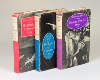 All three volumes of Lady Diana Cooper's memoirs, The Rainbow Comes and Goes, The Light of Common Day, and Trumpets from the Steep, each inscribed and signed by the author