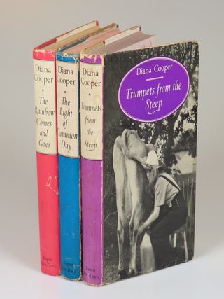 All three volumes of Lady Diana Cooper's memoirs, The Rainbow Comes and Goes, The Light of Common Day, and Trumpets from the Steep, each inscribed and signed by the author