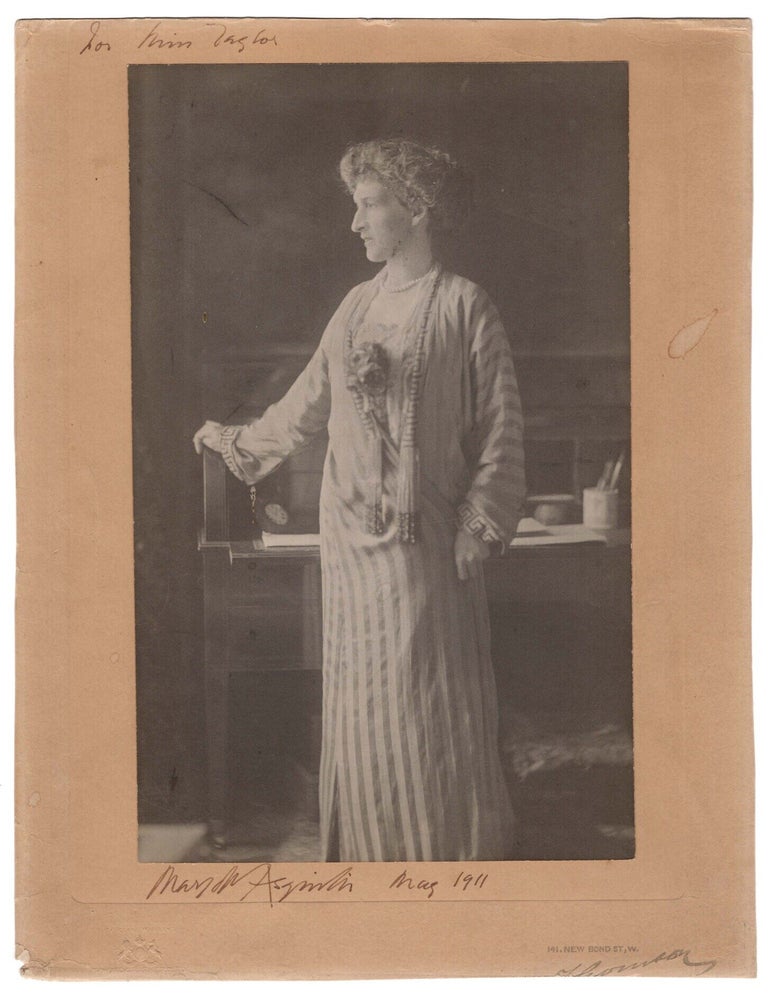 A mounted presentation studio portrait photograph of Margot Asquith Countess of Oxford and...
