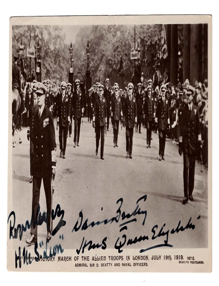 A First World War photographic postcard featuring the monumental Victory March of the Allied...