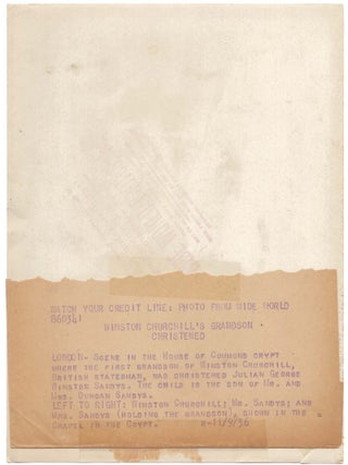 WINSTON CHURCHILL'S GRANDSON CHRISTENED - An original 2 November 1936 press photograph of Winston S. Churchill with his eldest daughter, his son-in-law, and his first grandson at his grandson's christening in the chapel in the House of Commons crypt